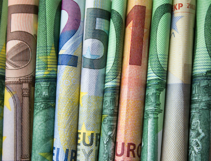 Shutterstock By hanohiki, euro bills rolled side by side, company's liquidity